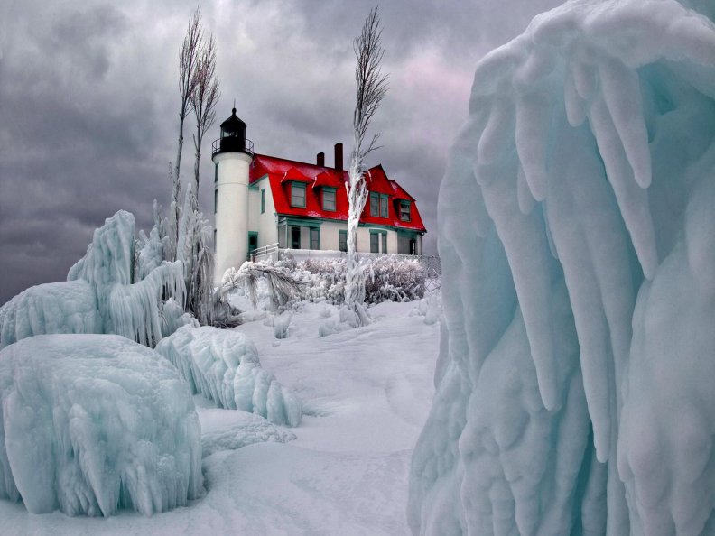 marvelous lighthouse on a frozen hill