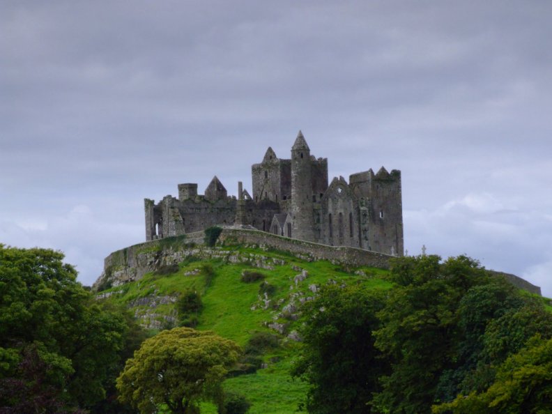 castle_on_mountaintop_in_cashel_rock_ireland.jpg