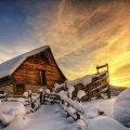 wooden mountain cabin in winter
