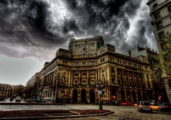 dark stormy clouds over barcelona spain hdr
