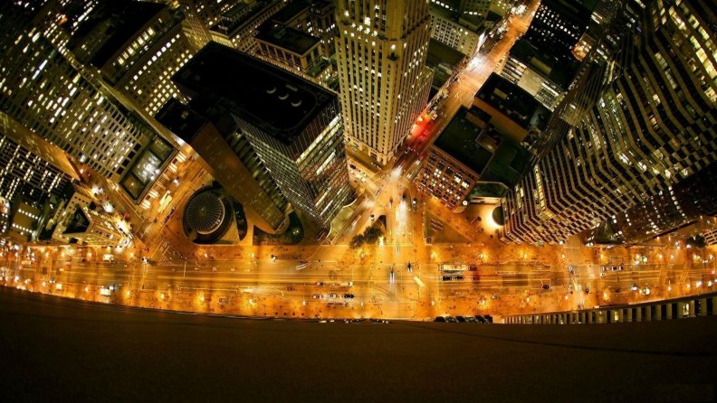 aerial_view_down_a_skyscraper_at_night.jpg