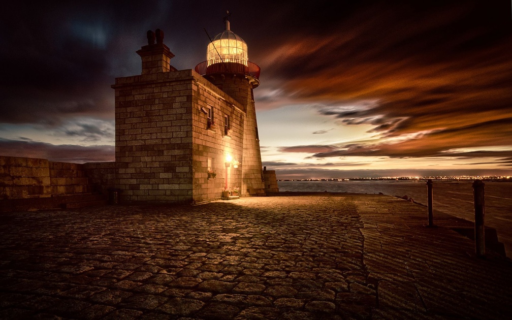 beautiful stone lighthouse at twilight hdr