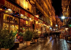 restaurant on a side street in lyon at night hdr