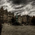 storm clouds over city square in antwerp belgium hdr