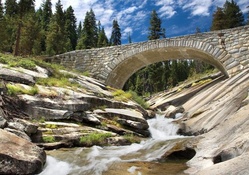 stone bridge over river ravine