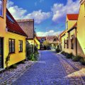 lovely yellow house in a denmark town hdr