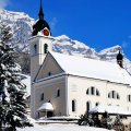beautiful mountain church in winter