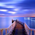 pier on a calm sea at dusk