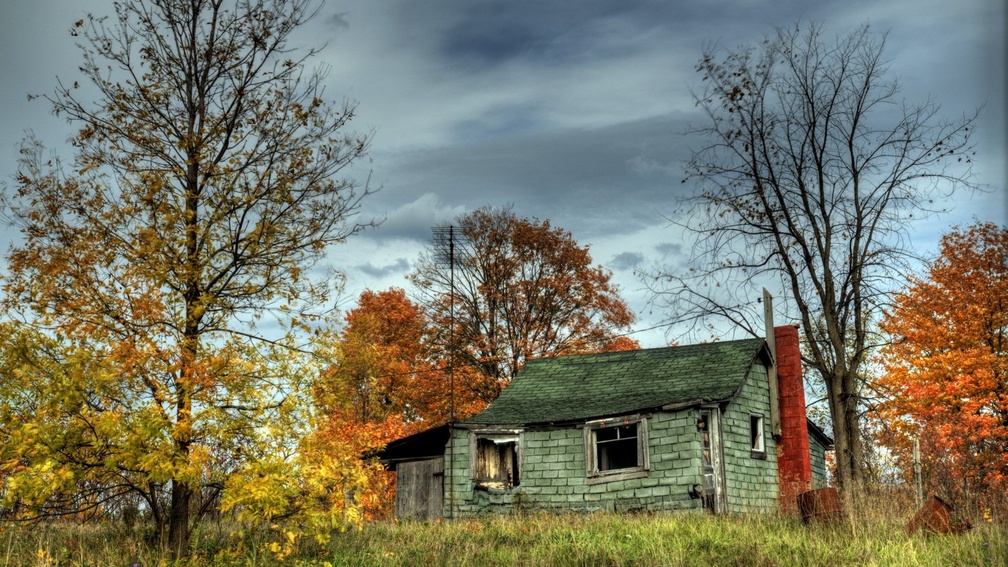 abandoned cabin in a autumn forest hdr