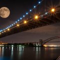 moon over the triborough bridge in nyc