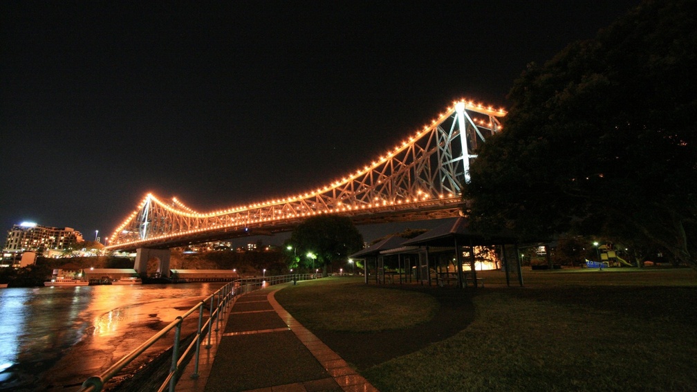 lit up bridge at night