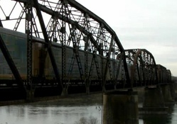 truss railroad bridge over river
