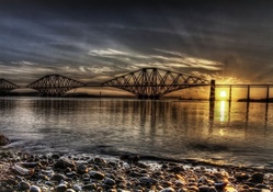 the forth rail bridge in scotland in gorgeous sunset hdr