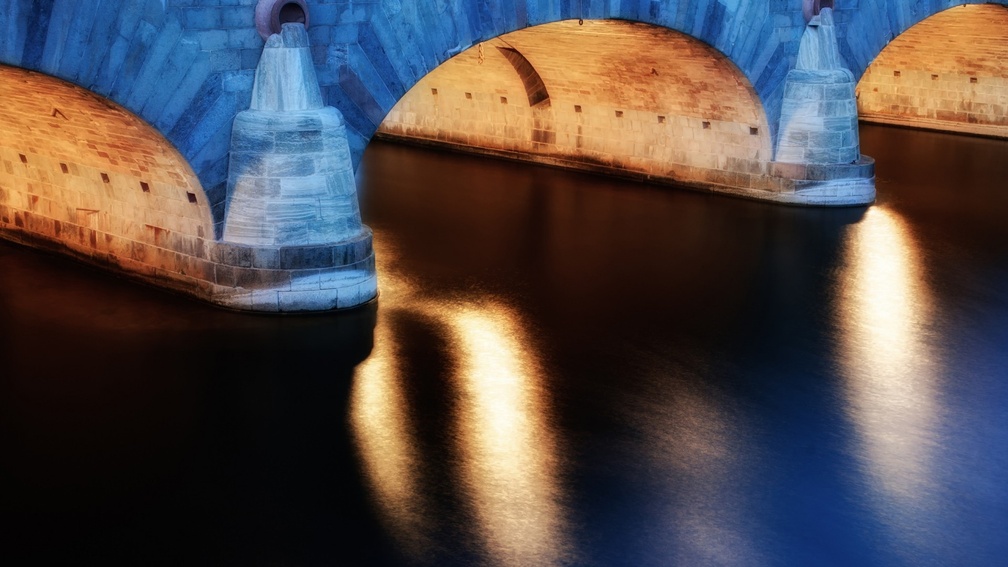 arched stone bridge at night hdr