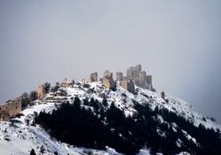 medieval castle ruins on a mountain in italy