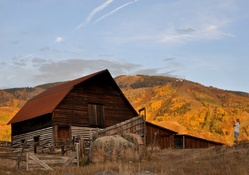 Old Barn in Autumn Landscape