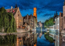 tranquil canal in bruges belgium in evening