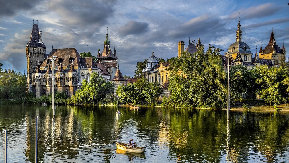 boating on a castle lake in budapest hdr