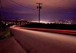 lights on a hillside road in long exposure