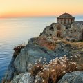 church ruins on a greek isle at sunset