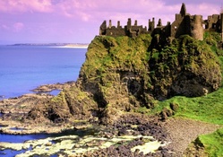 dunluce castle on a sea cliff in northern ireland