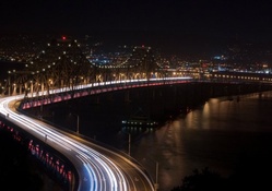 car lights on a bridge in long exposure