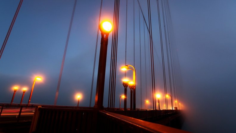 golden_gate_bridge_lanterns_in_fog.jpg