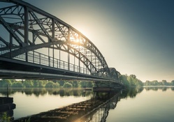 lovely iron bridge over wide river
