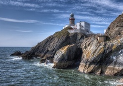 superb lighthouse on a cliff hdr