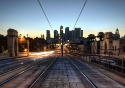trolley tracks over a city bridge hdr
