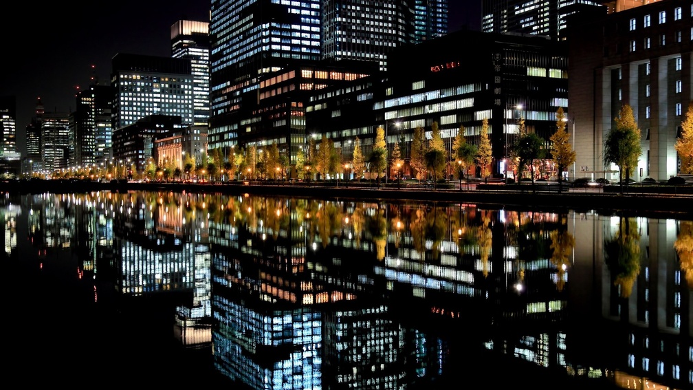 tokyo reflected in waterfront at night