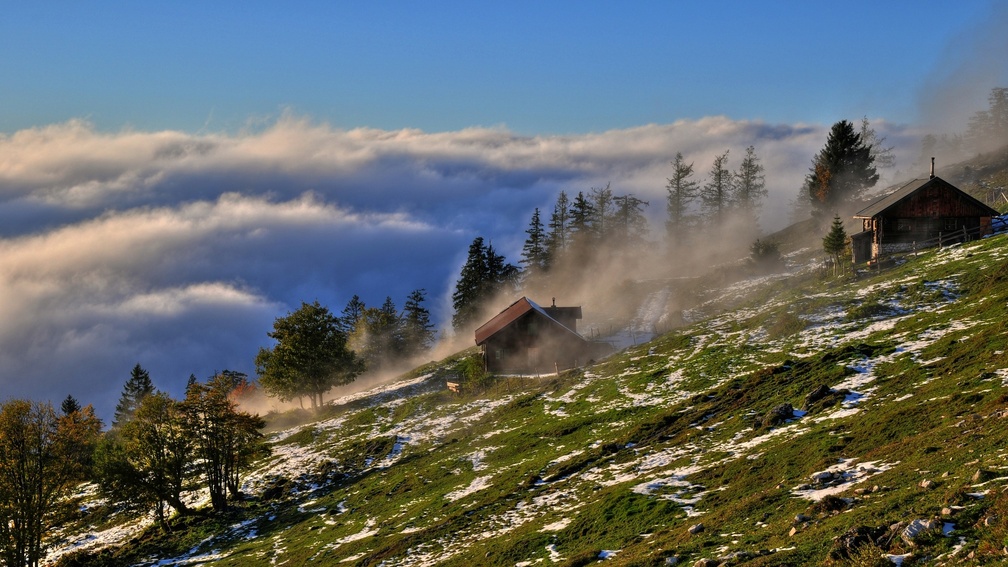 mountain cabins above the clouds