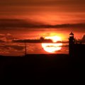 cape arago lighthouse in spectacular sunset