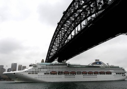 Cruise Ship Under Bridge