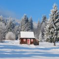 wonderful red trimmed cabin in winter