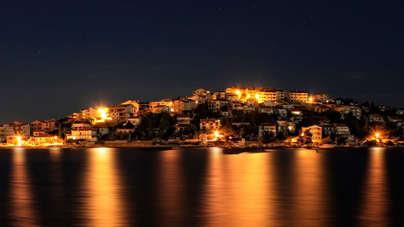 fantastic coastal village at night