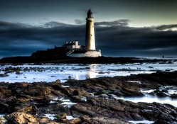 wonderful lighthouse on a rocky shore