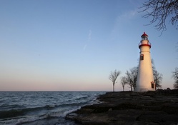 beautiful lighthouse on a rocky shore