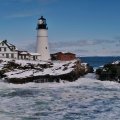lighthouse on a rugged seacoast in winter