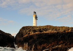 wonderful scottish lighthouse on a rocky coast