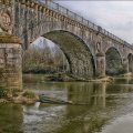 old arched stone bridge