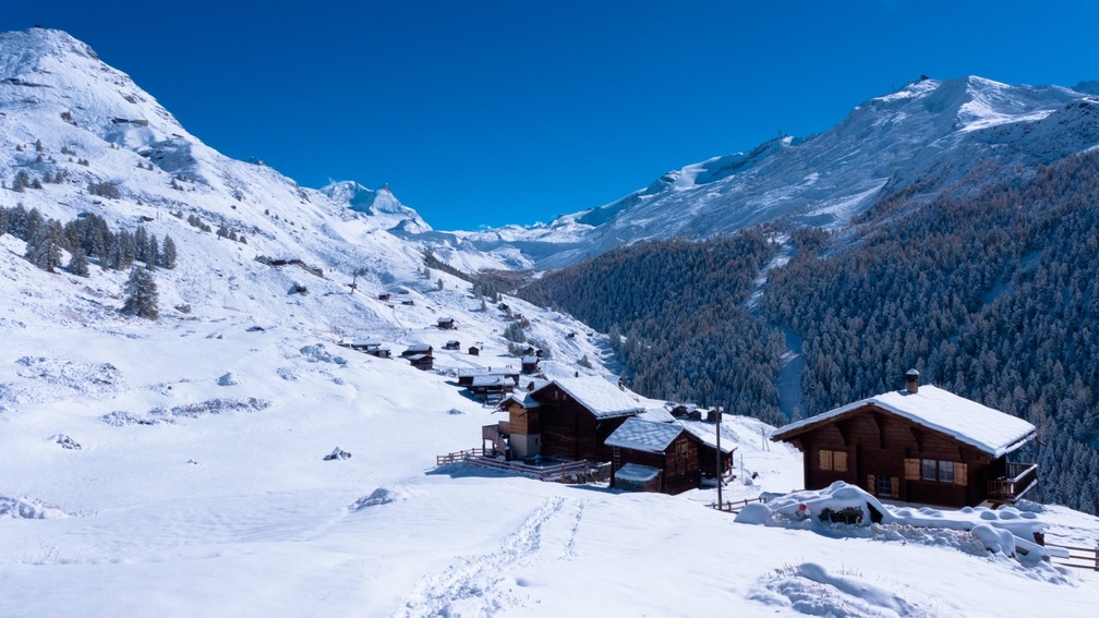 lodges on a mountainside in winter