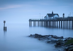 beautiful pier in a misty sea