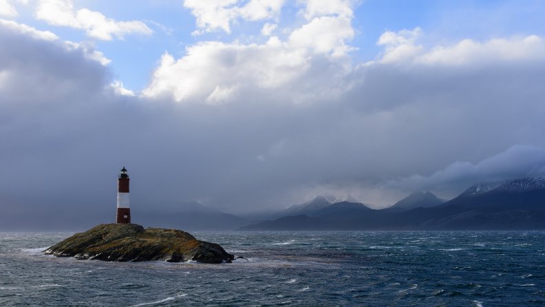 lighthouse on an island off shore