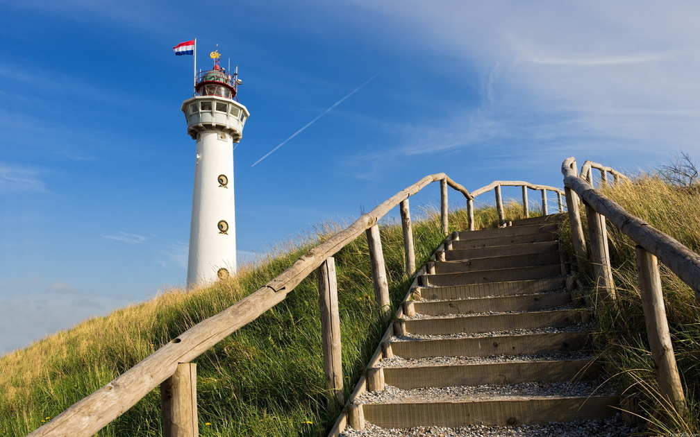 steps to a tall lighthouse in holland