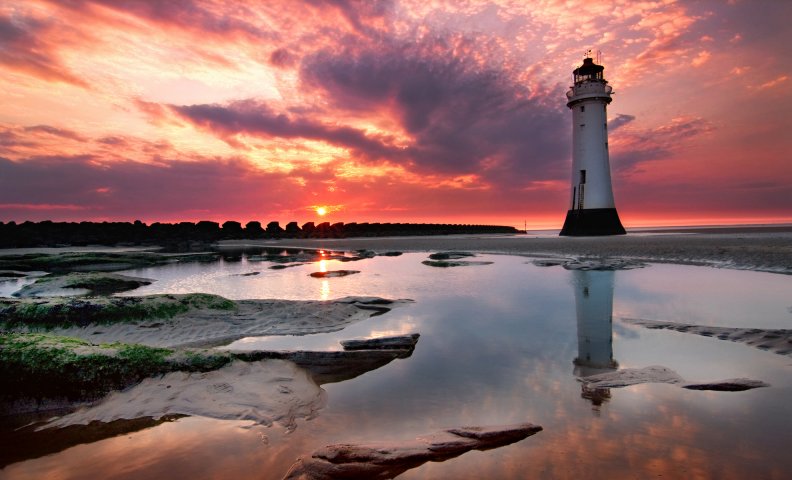 wonderful_lighthouse_at_sunset.jpg