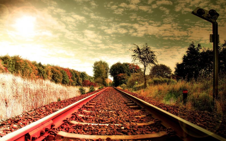 railroad tracks in a bright autumn day