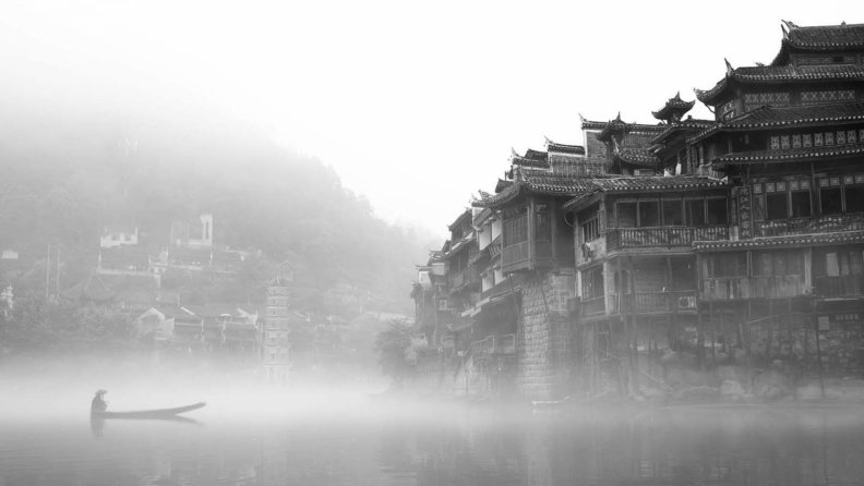 ancient_chinese_town_on_a_misty_river.jpg