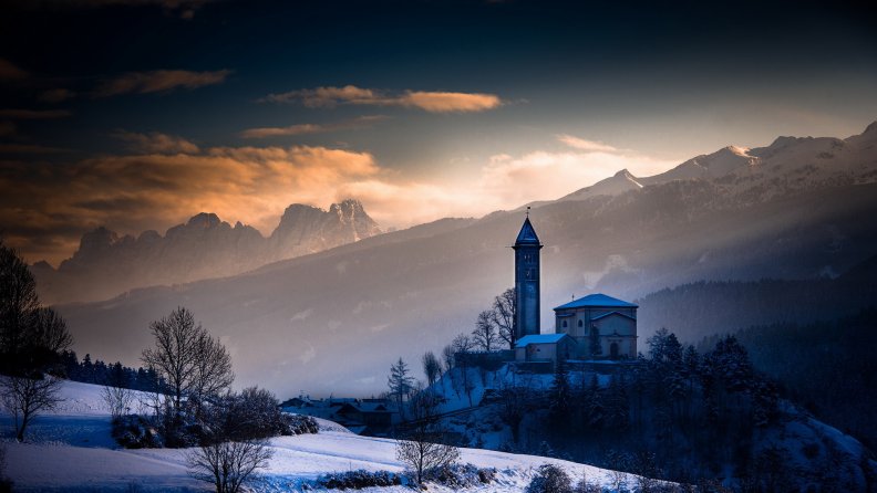 church above a village in the mountains