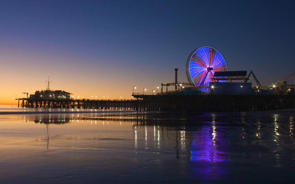 amusement park on a pier at twilight